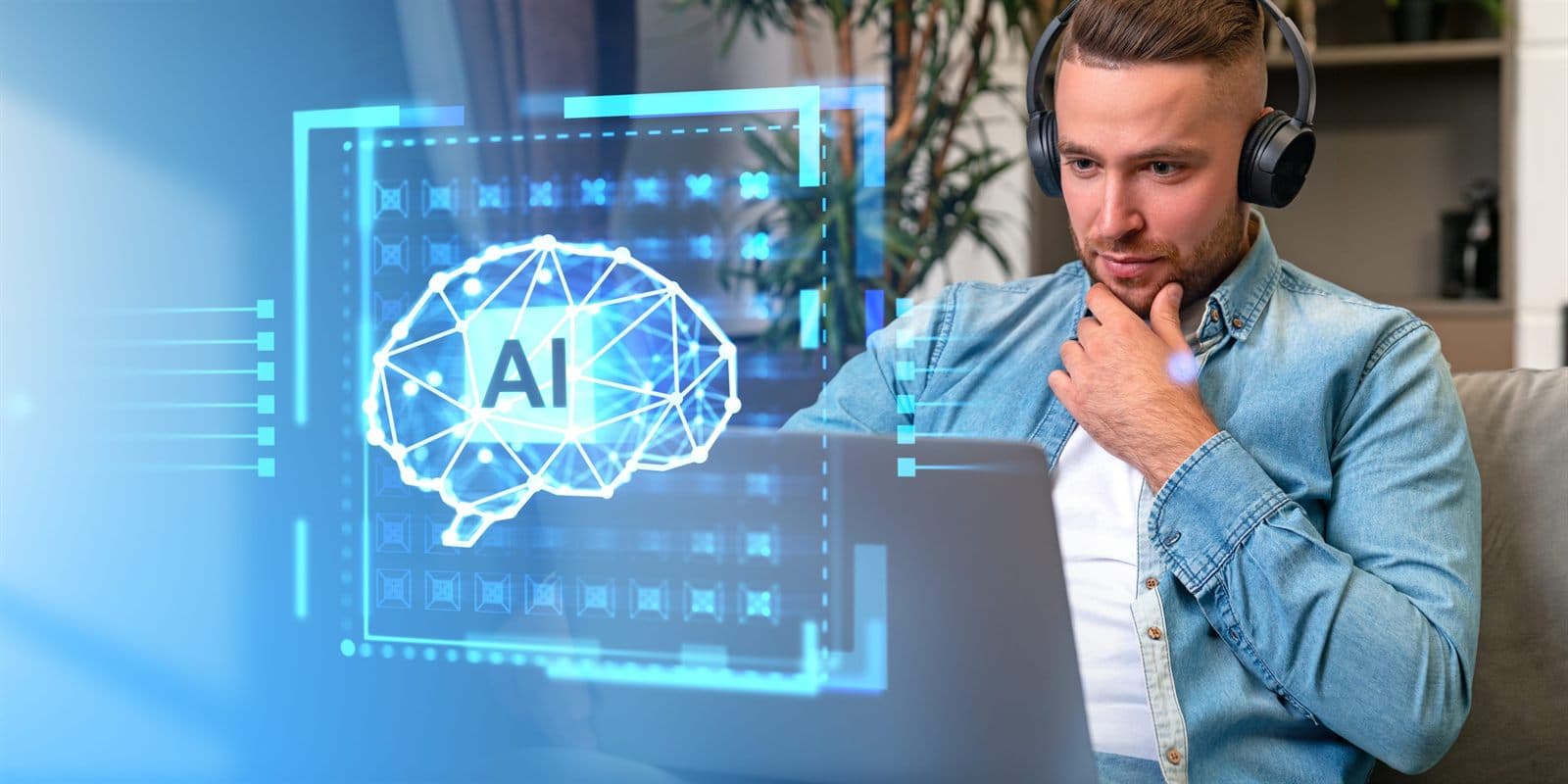A person at a laptop beside an illustration of an AI brain